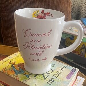 Dolly “Diamond in a Rhinestone world” White Ceramic Mug w/Floral in Inner Rim